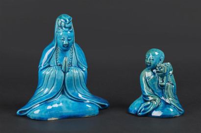 null CHINE
Une figure de Guanyin et une figure de bouddha en biscuit émaillé bleu...