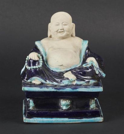 null CHINE
Figure de bouddha assis en biscuit émaillé aubergine et turquoise sur...