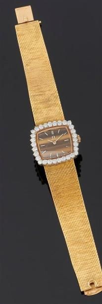 null OMEGA
Montre bracelet de dame en or jaune 750°/oo, le cadran quartz "oeil de...