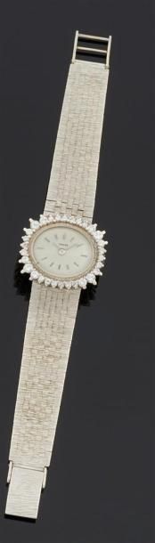 null PARKER
Montre bracelet de dame en or gris 750°/oo, la montre de forme ovale,...