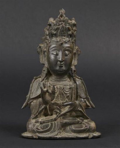 null CHINE - Epoque MING (1368 - 1644)
Statuette de bouddha en bronze à patine brune,...