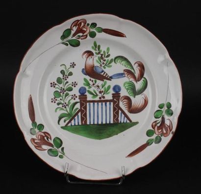 null LES ISLETTES.LE BOIS D'EPENSE.Assiette à bord contourné à décor polychrome d'une...