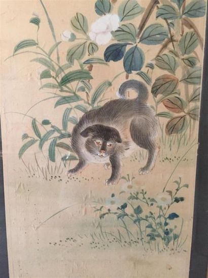 null JAPON, XIXème siècle
Encre et couleurs sur soie représentant un chien dans un...
