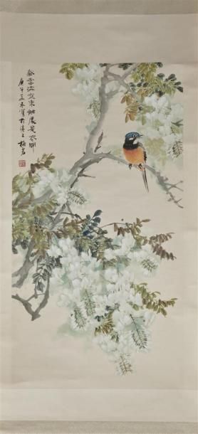null CHINE, XXe siècle 
Encre et couleurs sur papier représentant un oiseau perché...