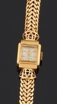 null Montre bracelet de dame en or jaune 750°/oo, la montre de forme carrée, cadran...
