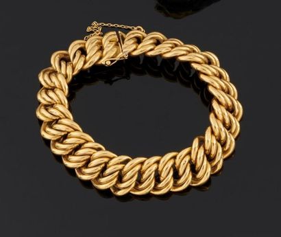 null Bracelet articulé en or jaune 750°/oo, les maillons double de forme ovale.
Poids...