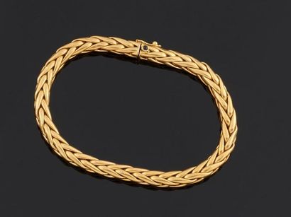 null CAPLAIN Paris
Bracelet articulé en or jaune 750°/oo, les maillons à décor de...