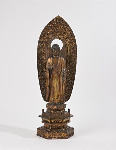 null JAPON - Epoque EDO (1603 - 1868)
Statuette de bouddha en bois laqué or, debout...