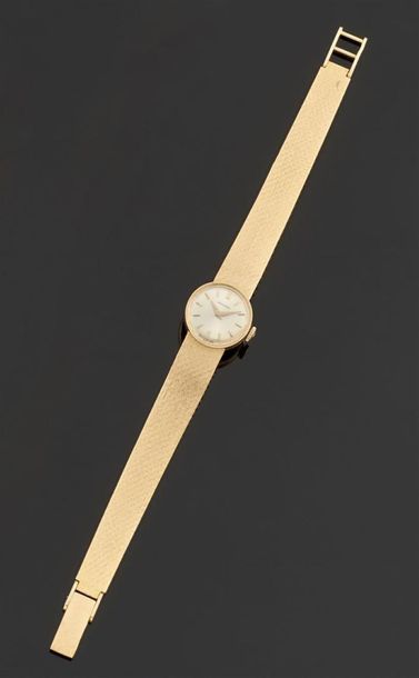 null MOVADO
Montre bracelet de dame en or jaune 750°/oo, la montre de forme ronde,...