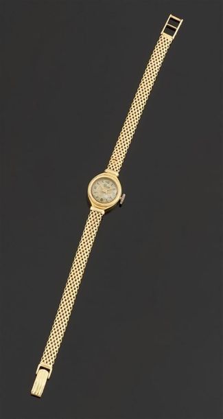 null PONCTA
Montre bracelet de dame en or jaune 750°/oo, la montre de forme ronde,...