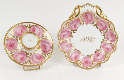 null PARIS
Un compotier coquille et une base circulaire en porcelaine à décor rose...
