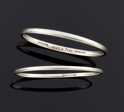 null TIFFANY & Co
Deux bracelets rigides en argent 925°/oo uni. (Usures)
Signés.
Diamètre...