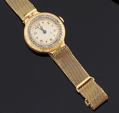 null MONTRE bracelet de dame en or jaune 750°/oo, la montre de forme ronde, cadran...