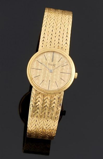 null PIAGET
Montre bracelet de dame en or jaune 750°/oo, la montre de forme ronde,...