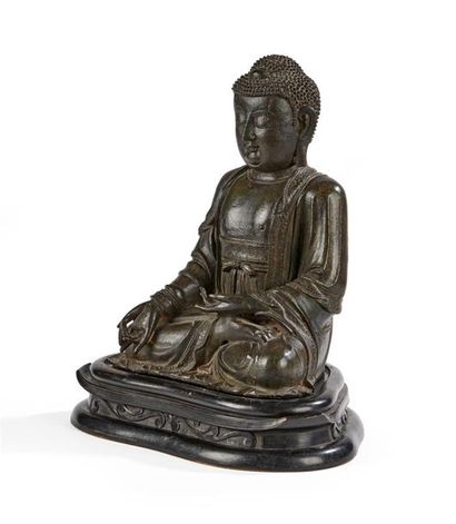 null CHINE - Epoque MING (1368 - 1644)
Statuette de bouddha de la médecine en bronze...