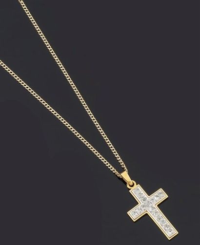 null Collier articulé en or jaune 750 millièmes, retenant en pendentif une croix...