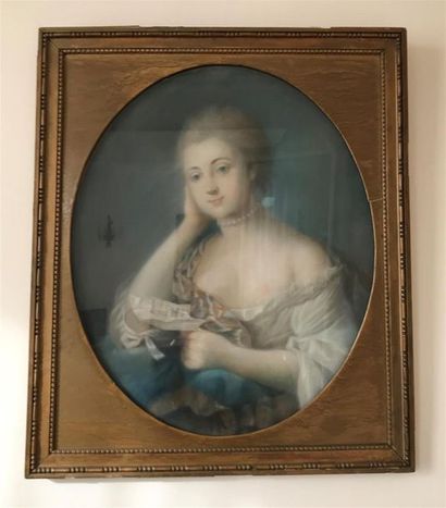 null ECOLE FRANCAISE du XVIIIe siècle 
Portrait de femme à la lettre. 
Pastel sur...