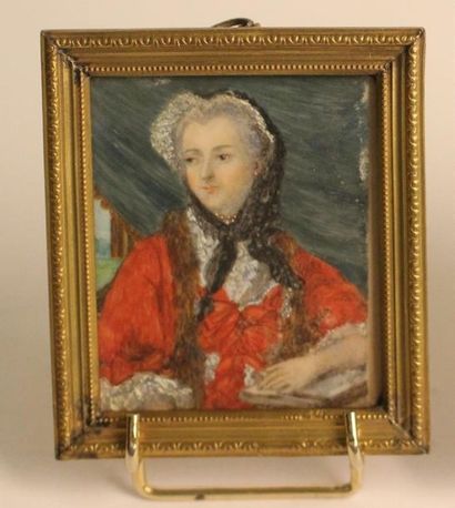 null ECOLE FRANCAISE du XIXe siècle 
Portrait de femme en robe rouge coiffée d'un...