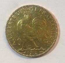 null Pièce OR. FRANCE

Pièce or, 20 francs Coq Marianne année 1912.

Poids : 6.45...