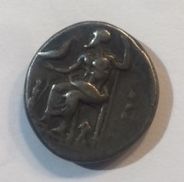 null Pièce Argent. Statère Grec ou Macédoine 

Monnaie antique à identifier, personnage...