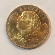 null Gold coin. Switzerland

A gold coin Swiss Cross 20frs, 1930.

A true Helvetian...