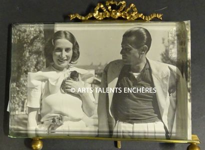 null PHOTOGRAPHY. Serge Lifar and Suzanne Lorcia around 1950 in a brass frame. 17...