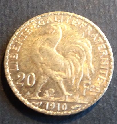 null Pièce OR. Pièce 20 francs Or au coq, 1910.
Poids : 6,45 g.