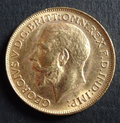 null Gold coin. Sovereign George V coin, Gold. 1914. Naked head of George V on the...