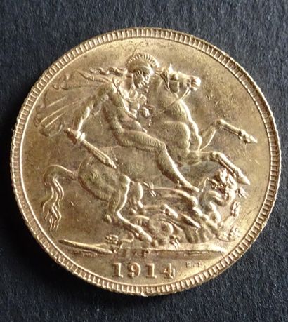 null Gold coin. Sovereign George V coin, Gold. 1914. Naked head of George V on the...