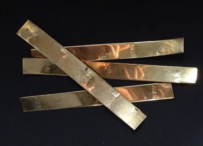 null GOLD. Set of 4 small gold bars, marked 18W ( carats ). Total weight : 16,12...