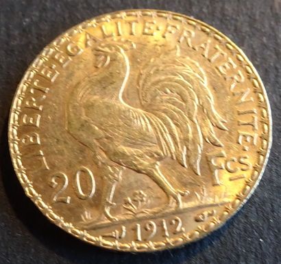 null Gold coin. Coin 20 francs Gold with rooster, 1912.
Weight : 6,48 g.