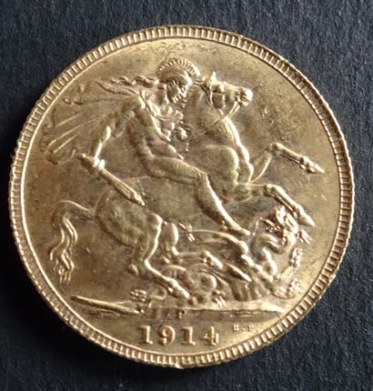 null Gold coin. Sovereign George V coin, Gold. 1914. Naked head of George V on the...