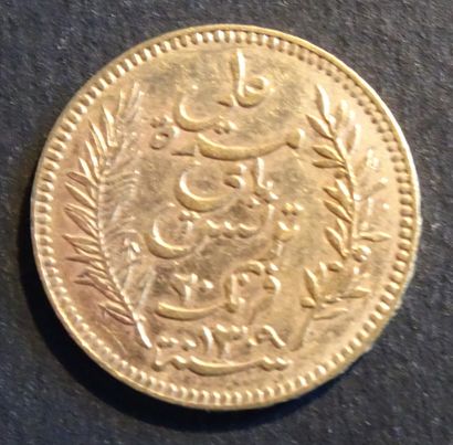 null Pièce OR. Pièce 20 francs OR Tunisie, 1892.
Poids : 6,46 g.