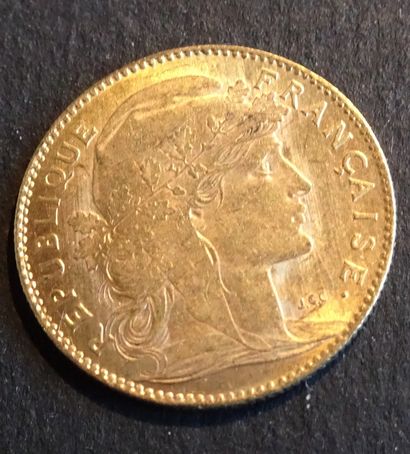 null Gold coin. Coin of 10 francs Coq OR, 1910.
Weight : 3,23 g.