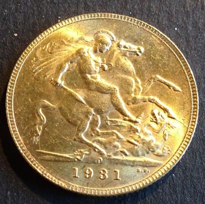 null Gold coin. Sovereign George V coin, Gold. 1931. Naked head of George V on the...