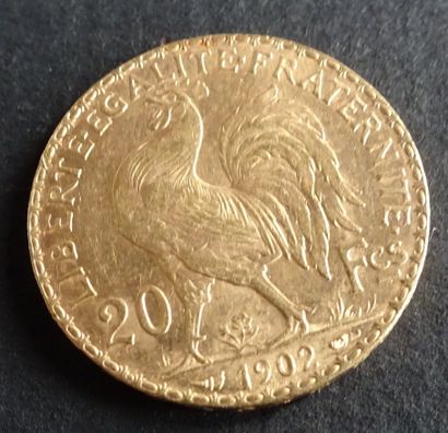 null Gold coin. Coin 20 francs Gold with rooster, 1902.
Weight : 6,47 g.