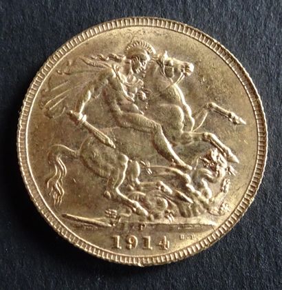 null Gold coin. Sovereign George V coin, Gold. 1914. Naked head of George V on the...