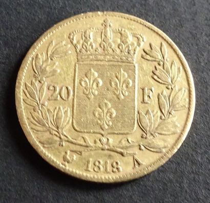 null Pièce OR. Pièce 20 francs Louis XVIII, or, tête nu. 1818.
Poids : 6,43 g.