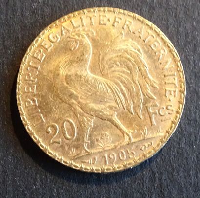 null Gold coin. Coin 20 francs Gold with rooster, 1905.
Weight : 6,49 g.