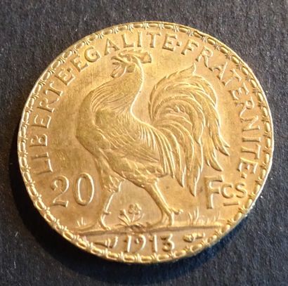 null Gold coin. Coin of 20 francs GOLD, Marianne, 1913.
Weight : 6,47 g.