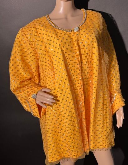 null Yellow tunic trimmed with rhinestones and gold sequins.
