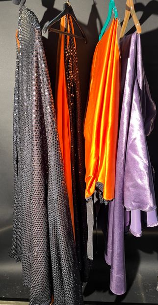 null 3 orange and black capes and a purple cape.
