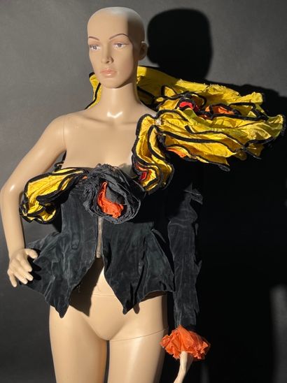 null YVES SAINT-LAURENT.
Artist's costume with flower bustier designed by Yves Saint-Laurent...