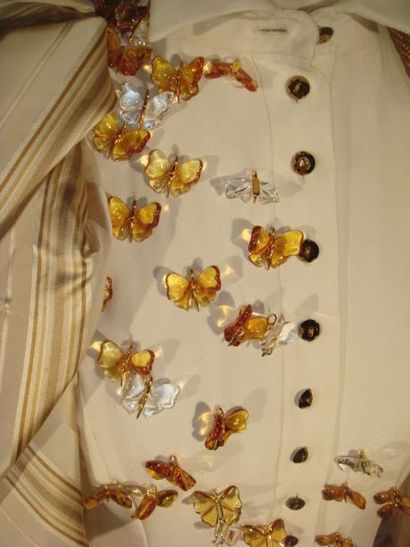 TORRENTE Robe crème avec incrustation de papillons en cristal de la dernière collection...