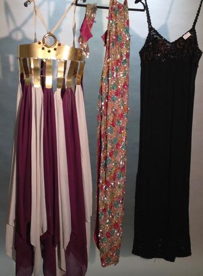 null Costumes Music-Hall
Manteau de zèbre + 2 robes pailletées disco + robe dans...