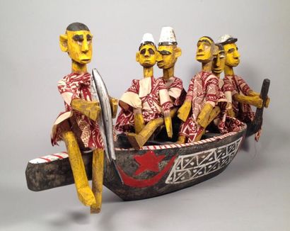 null Pirogue avec un groupe de 6 personnages (marionnettes) 

Bois peint en noir,...