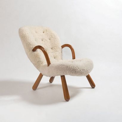 PHILIP ARCTANDER (1916-1994) 
Armchair model "Clam"
Birch and white woolly sheepskin...