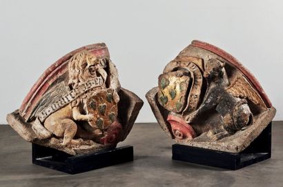 null Rare pair of important limestone bases carved in strong relief, gilded and polychrome...