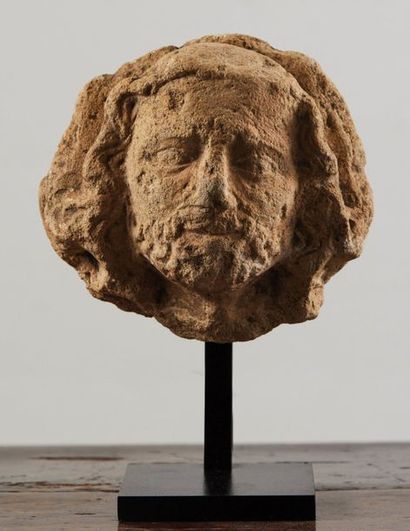 null Head of Christ or Apostle in limestone carved with traces of polychrome. Backed...