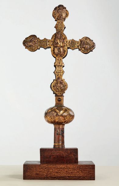 null Processional cross with a wooden core covered with repoussé copper, engraved...